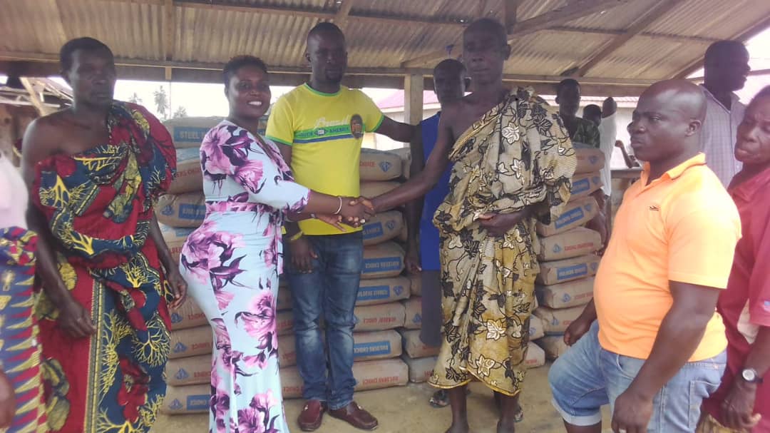 The NDC Parliamentary Candidate, Madam Dorcas Affo-Toffey Donates 50bags of Cement to the Mbem Community